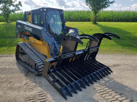 skid steer bucket attachment patent|heavy duty skid steer attachments.